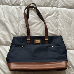 Calvin Klein navy with leather purse. Bag. Great condition.